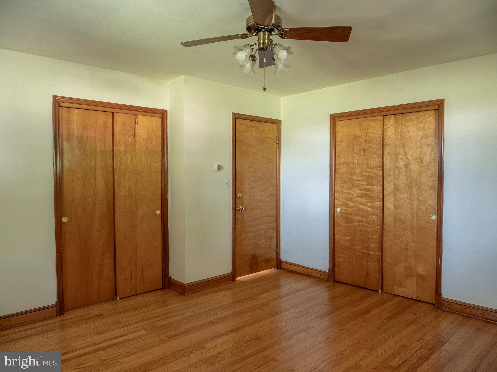 26906 Clarksburg Road Damascus, MD 20872 - Photo 13 of 17 a view of an empty room with wooden floor