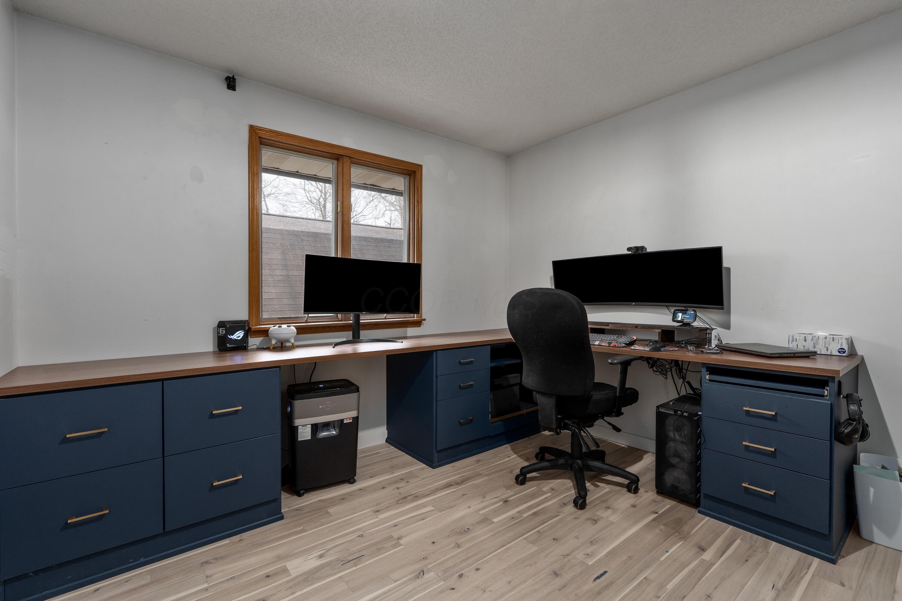 7173 Refugee Road Southwest Pataskala, OH 43062 - Photo 28 of 53 Bedroom 2 is currently used as a home office with 2 builtin desks