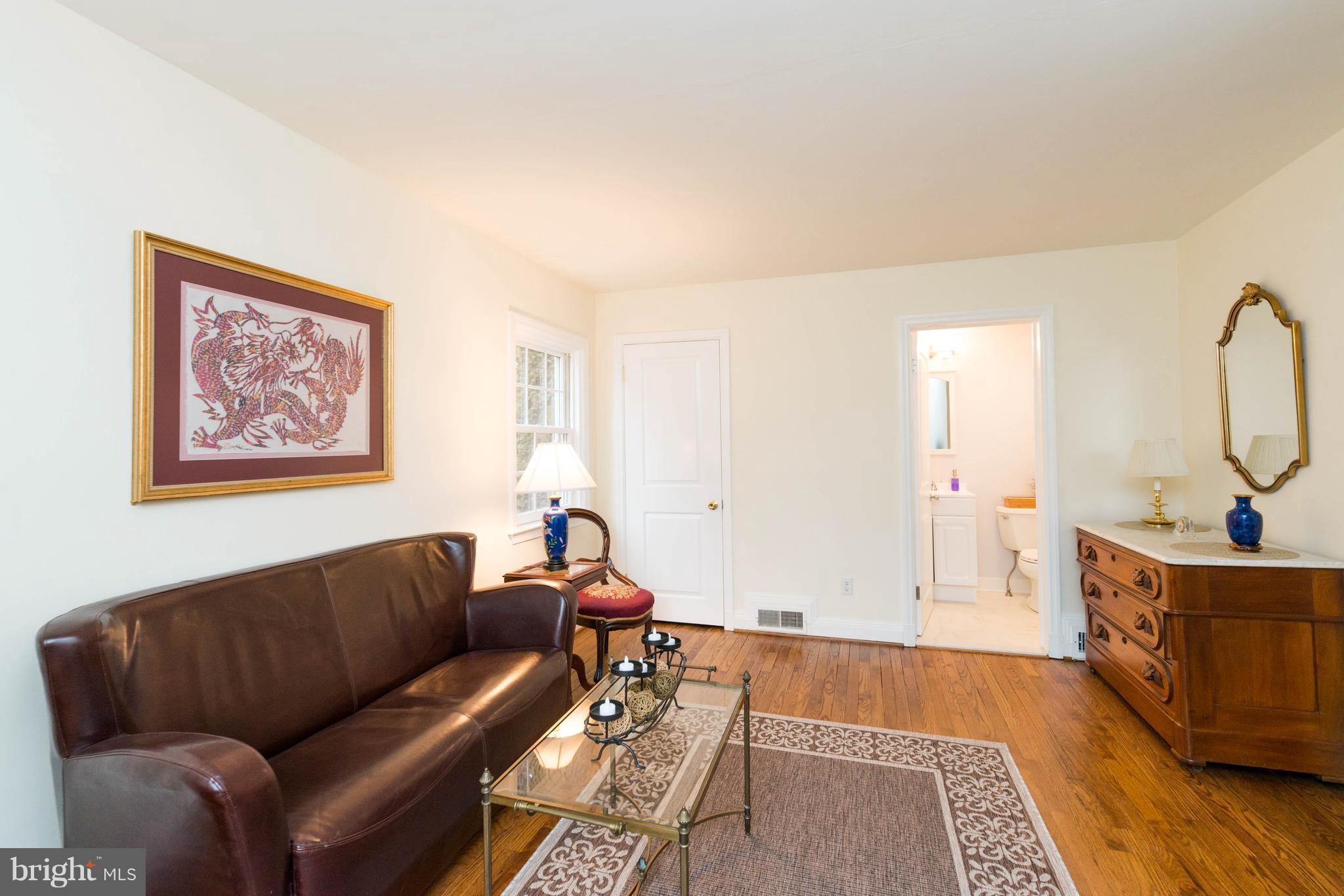 624 Wilton Road Baltimore, MD 21286 - Photo 13 of 30 a living room with furniture and a wooden floor