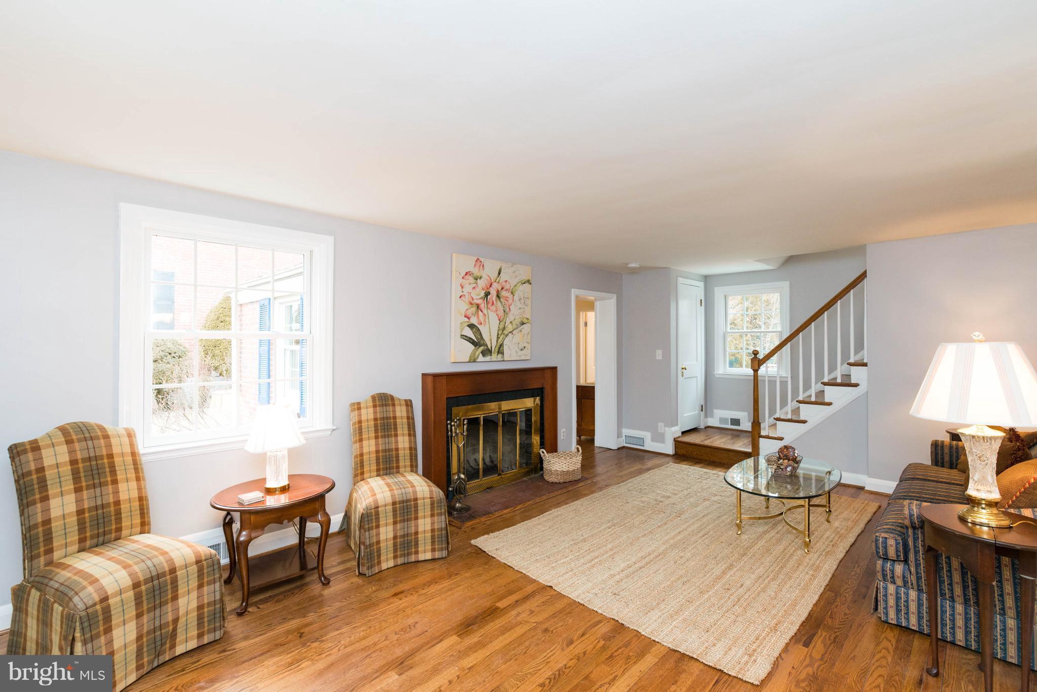 624 Wilton Road Baltimore, MD 21286 - Photo 3 of 30 a living room with furniture and a fireplace