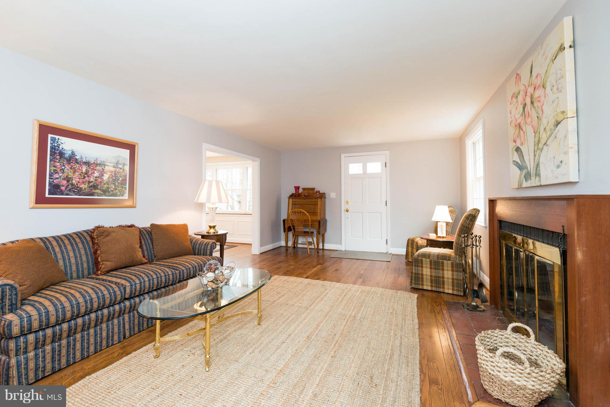 624 Wilton Road Baltimore, MD 21286 - Photo 5 of 30 a living room with furniture and a fireplace