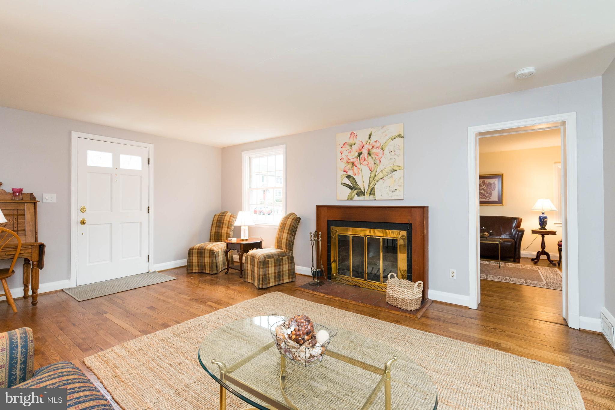 624 Wilton Road Baltimore, MD 21286 - Photo 6 of 30 a living room with furniture and a fireplace