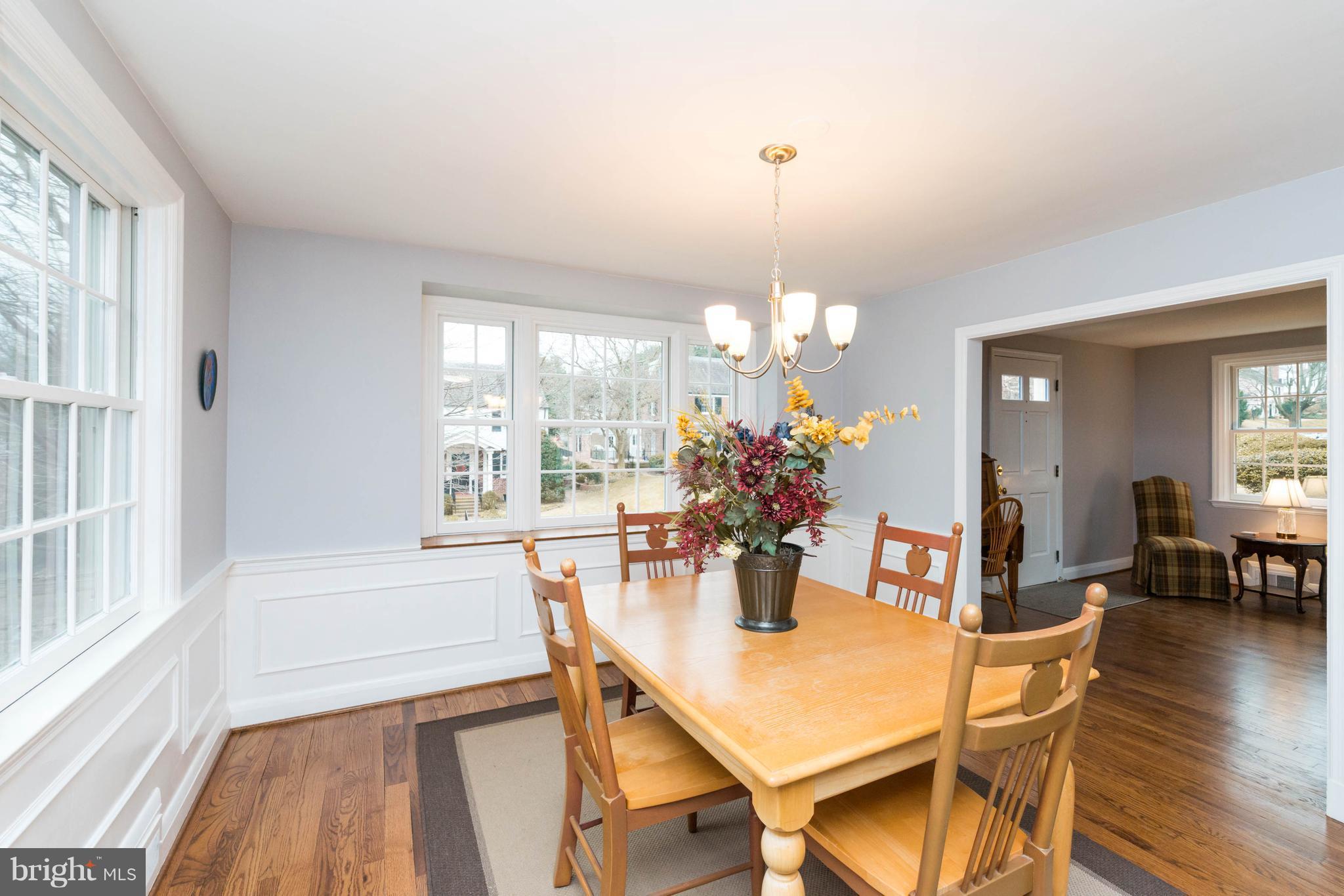 624 Wilton Road Baltimore, MD 21286 - Photo 8 of 30 a view of a dining room with furniture and wooden floor