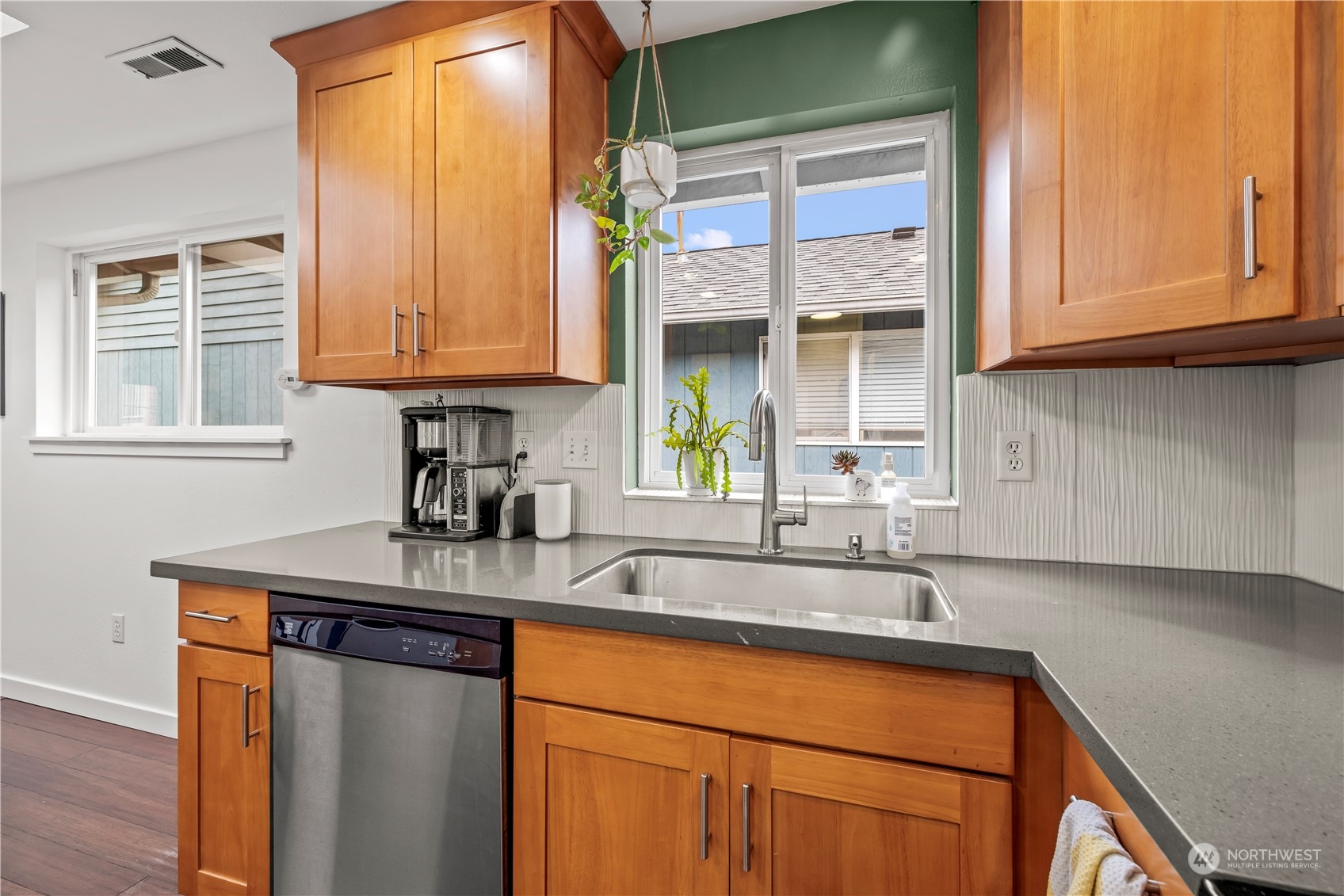 2847 Southwest Dakota Street Seattle, WA 98126 - Photo 15 of 39 a kitchen with stainless steel appliances granite countertop a sink and a window