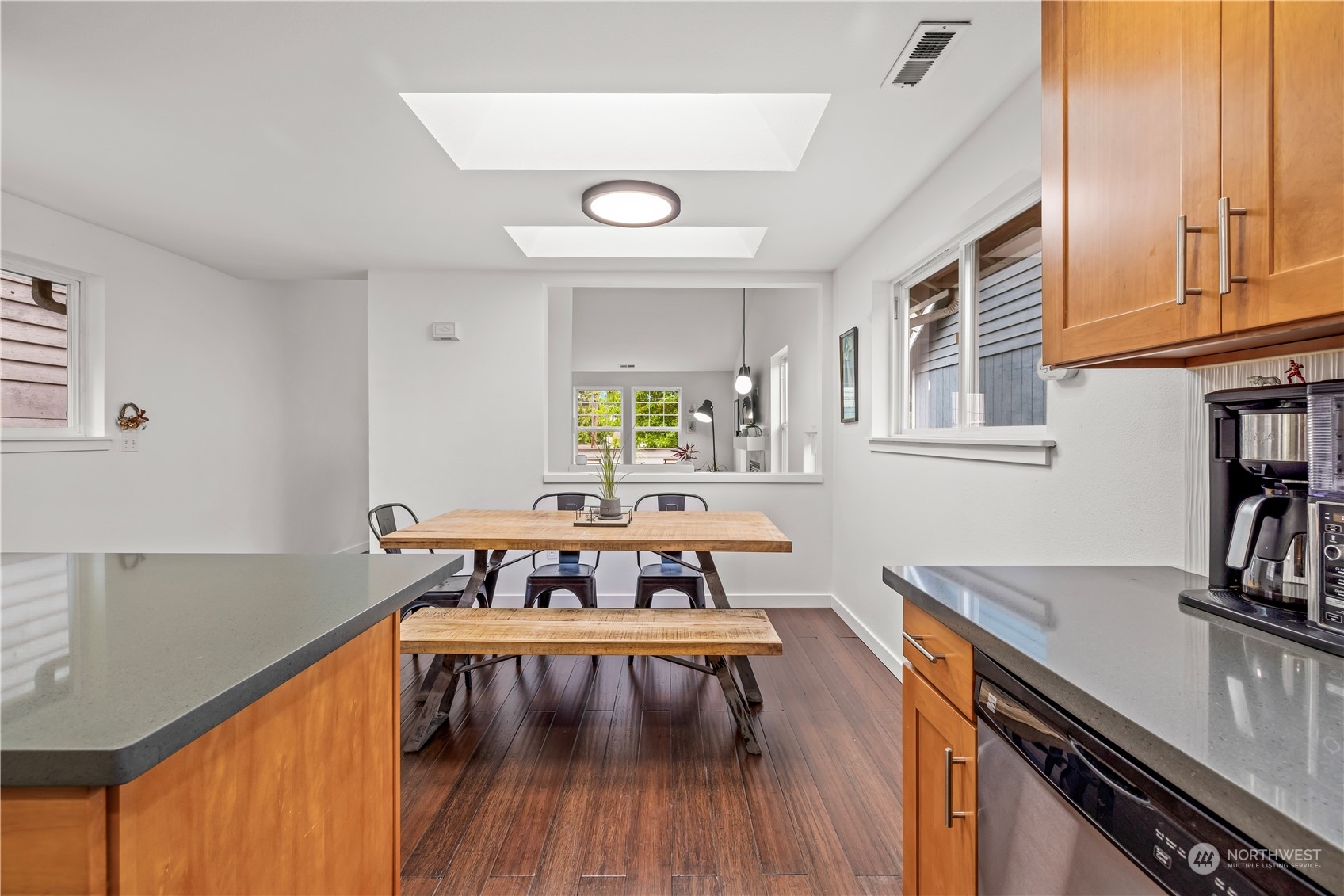 2847 Southwest Dakota Street Seattle, WA 98126 - Photo 16 of 39 a view of a dining room with furniture and wooden floor