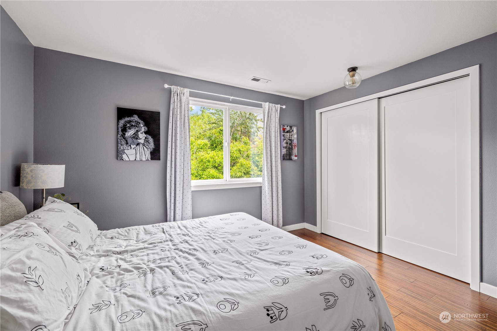 2847 Southwest Dakota Street Seattle, WA 98126 - Photo 22 of 39 a bedroom with a bed and a window