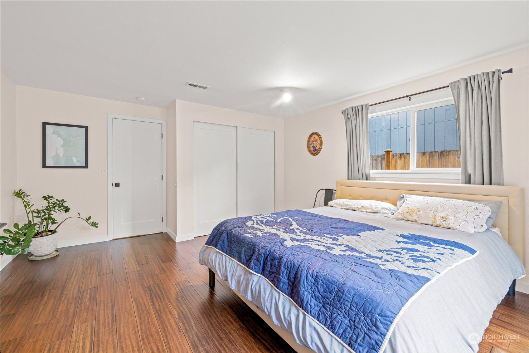 2847 Southwest Dakota Street Seattle, WA 98126 - Photo 24 of 39 a bedroom with a bed and a window