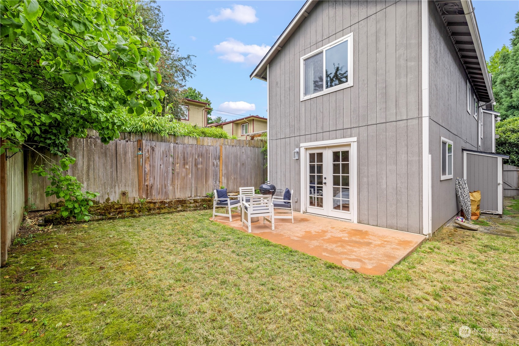 2847 Southwest Dakota Street Seattle, WA 98126 - Photo 34 of 39 a view of backyard of house with green space and seating area