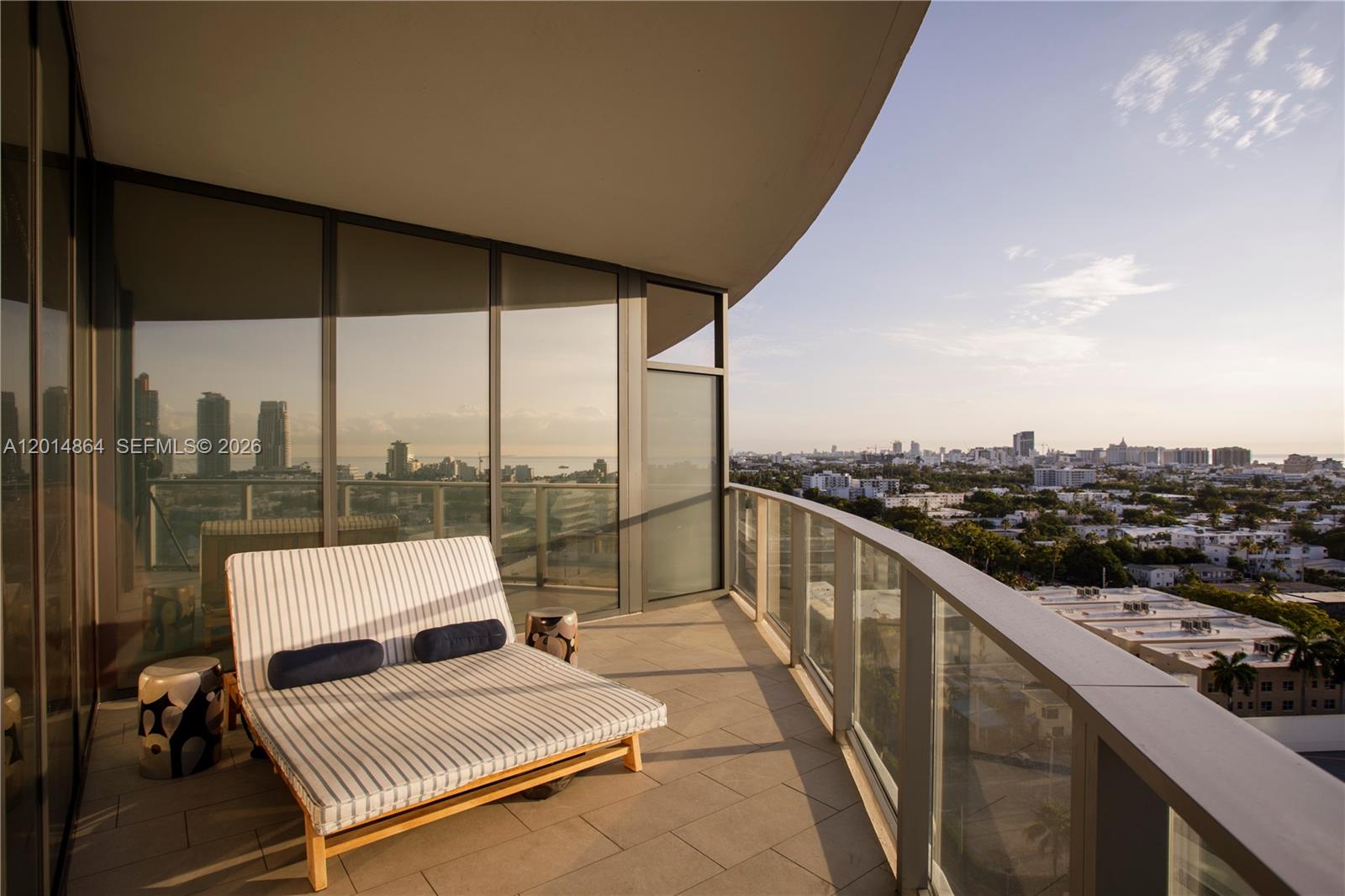 500 Alton Road, Unit 1601 Miami Beach, FL 33139 - Photo 18 of 20 a balcony with furniture and city view