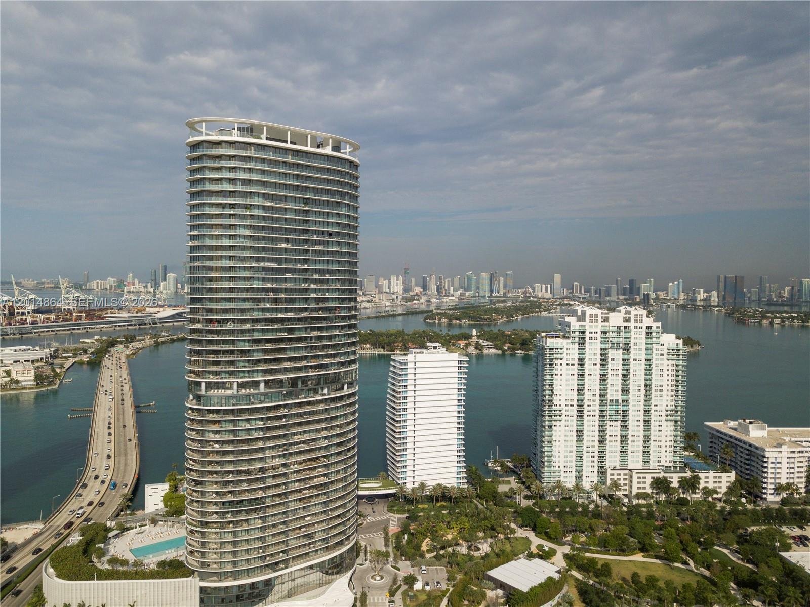 500 Alton Road, Unit 1601 Miami Beach, FL 33139 - Photo 19 of 20 a view of a balcony with chairs
