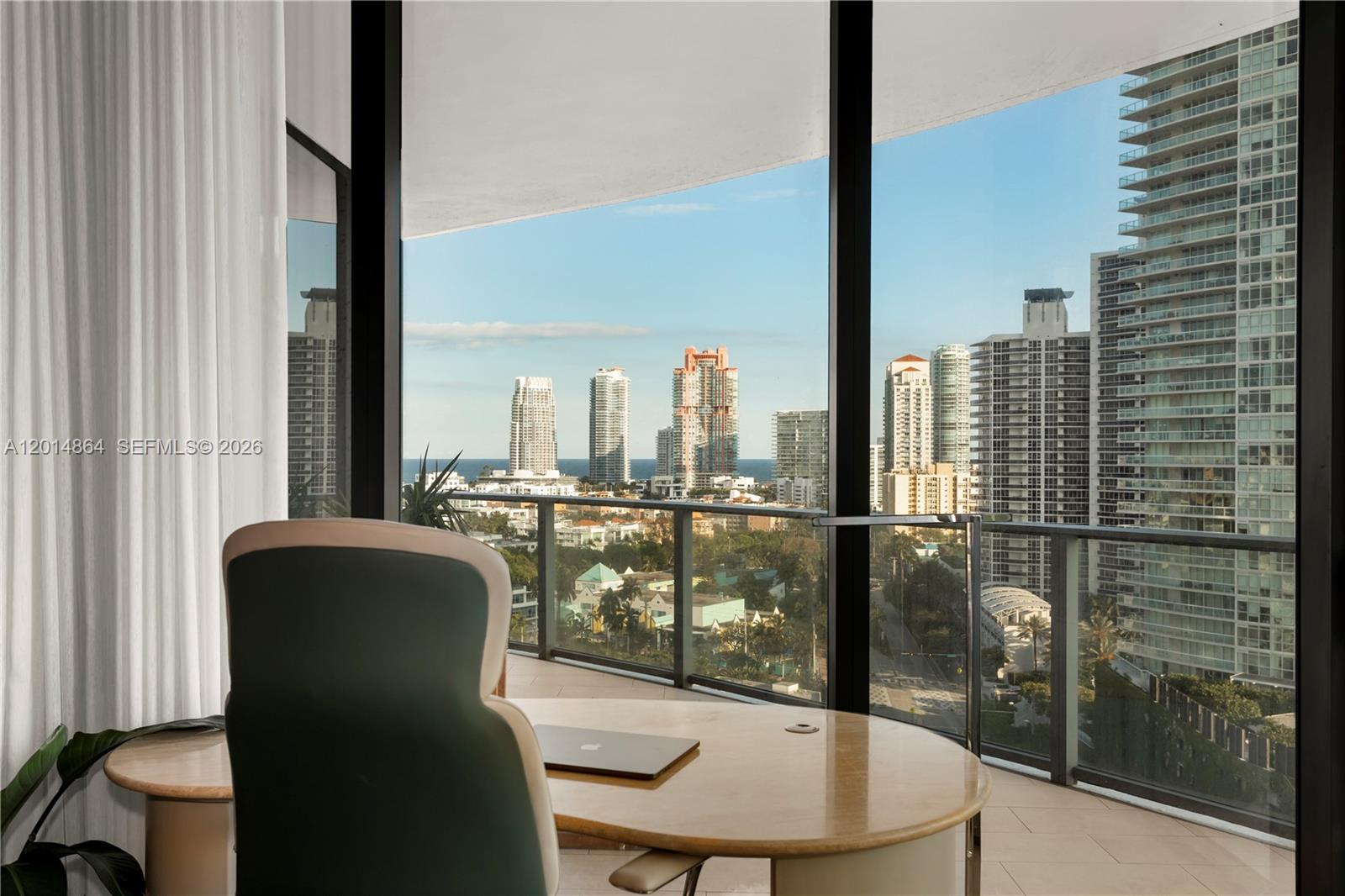 500 Alton Road, Unit 1601 Miami Beach, FL 33139 - Photo 10 of 20 a view of a balcony with chairs