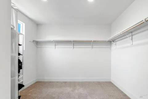 a view of an empty walk in closet