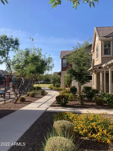 a view of a lake with couches and sky view