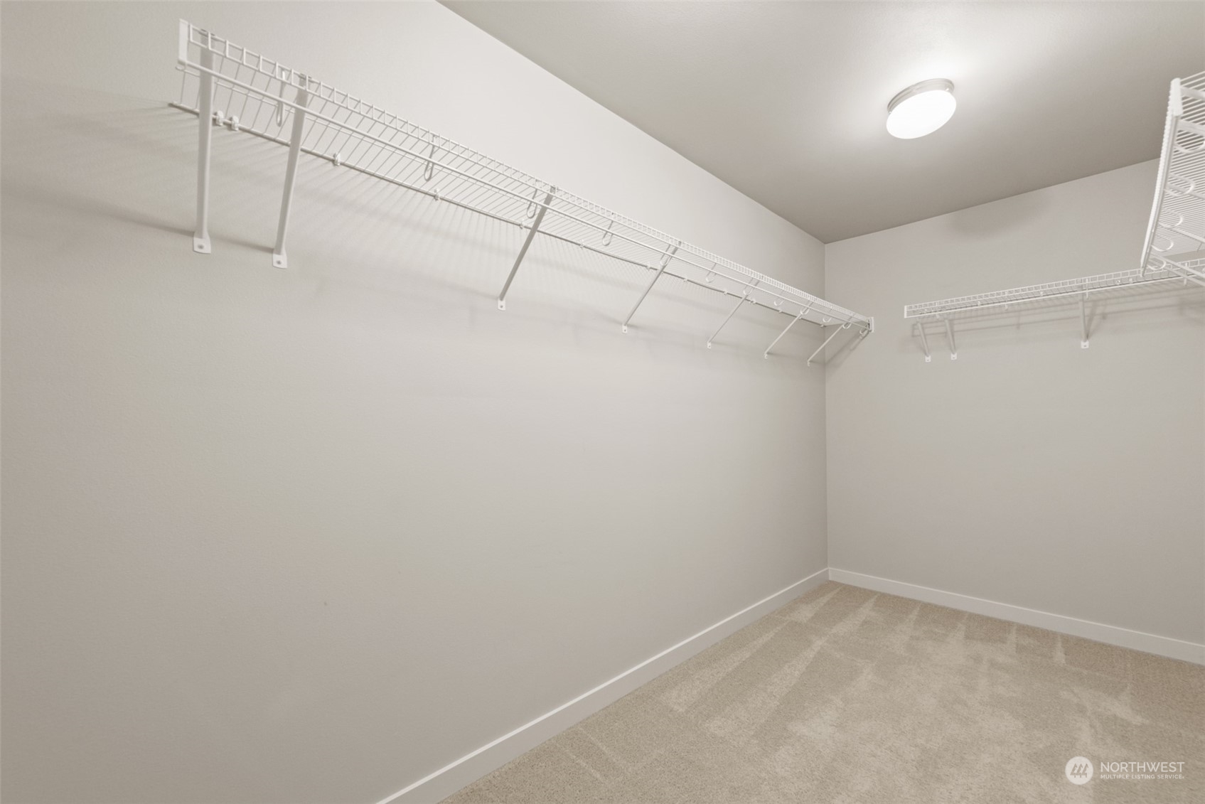 3530 215th Place Southeast Bothell, WA 98021 - Photo 22 of 35 a view of a room with racks on the wall
