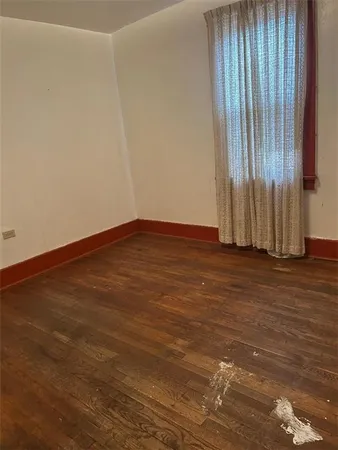 a bathroom with a sink toilet and a mirror