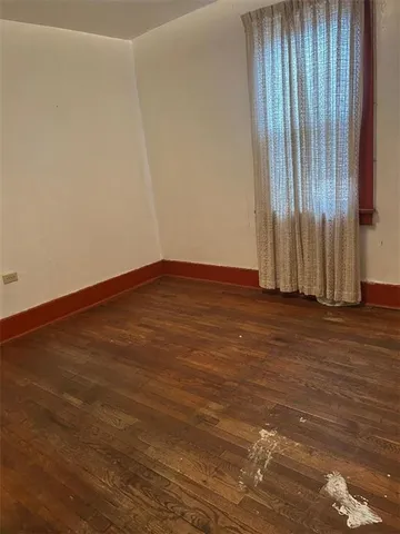 a bathroom with a sink toilet and a mirror