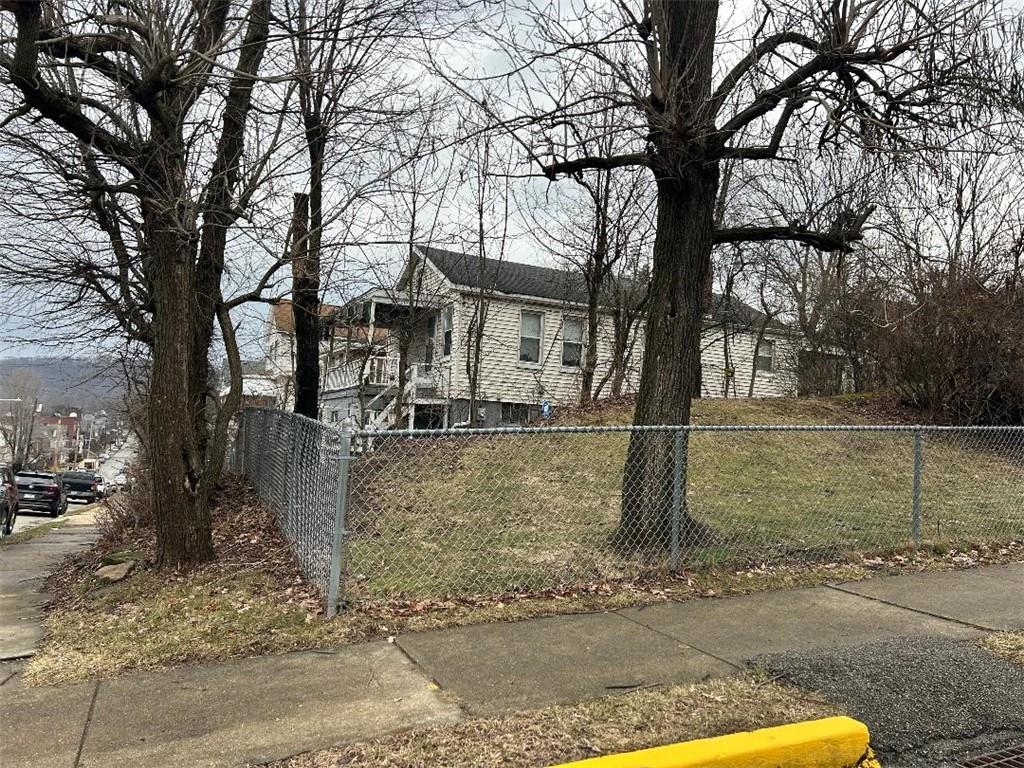 204 2nd Street Trafford, PA 15085 - Photo 2 of 13 a view of a yard with a tree
