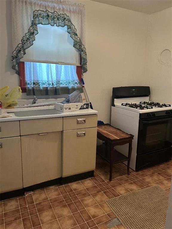 204 2nd Street Trafford, PA 15085 - Photo 4 of 13 a room with storage and utility