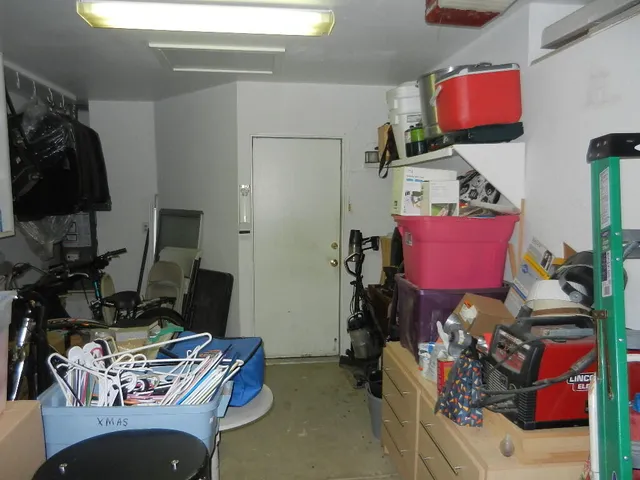 a view of a backyard with sitting area