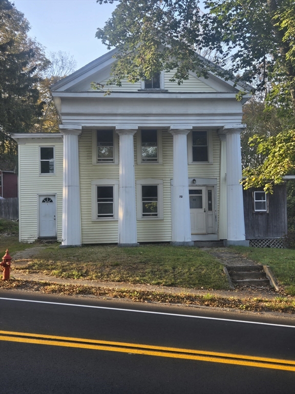 72 Maple Street Warren, MA 01083 - Photo 2 of 16 a view of a house with a yard
