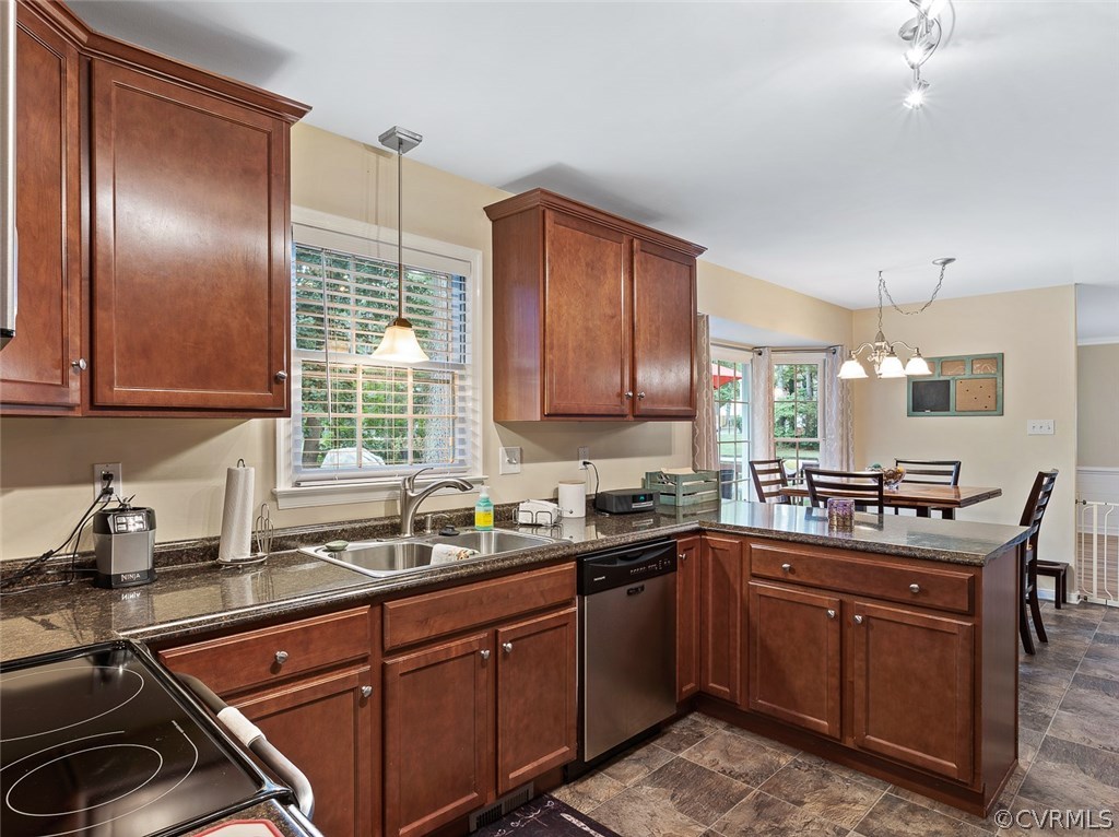 4409 Fordham Road Chesterfield, VA 23236 - Photo 10 of 27 a kitchen with a sink stove and cabinets