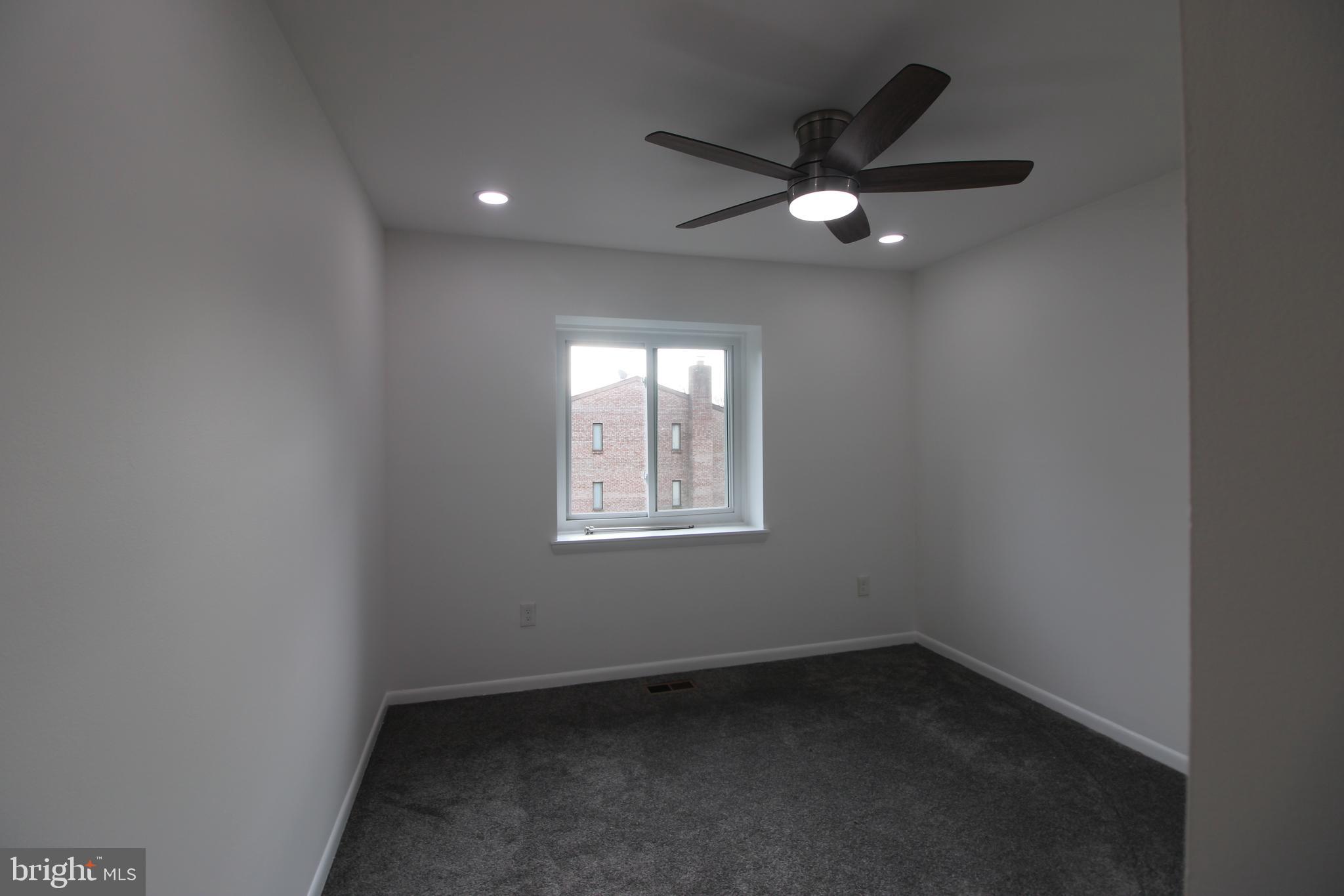 3007 Mission Square Drive Fairfax, VA 22031 - Photo 9 of 13 an empty room with a window and a fan