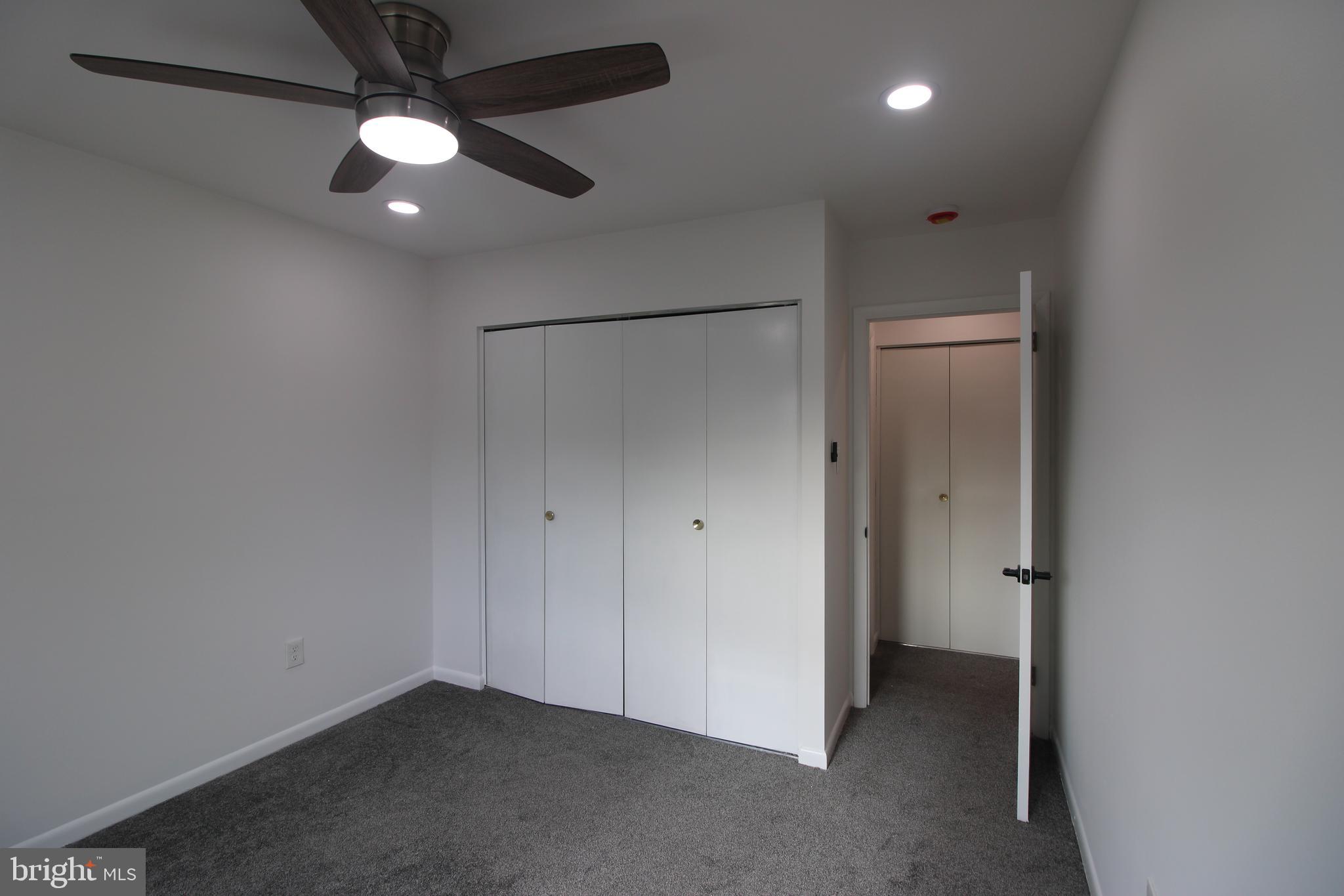 3007 Mission Square Drive Fairfax, VA 22031 - Photo 10 of 13 an empty room with closet and a ceiling fan