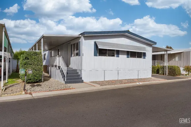 a view of a house with a street