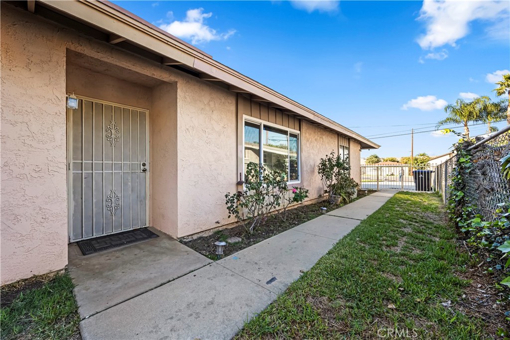 2520 14th Street Riverside, CA 92507 - Photo 16 of 17 a view of a house with a yard