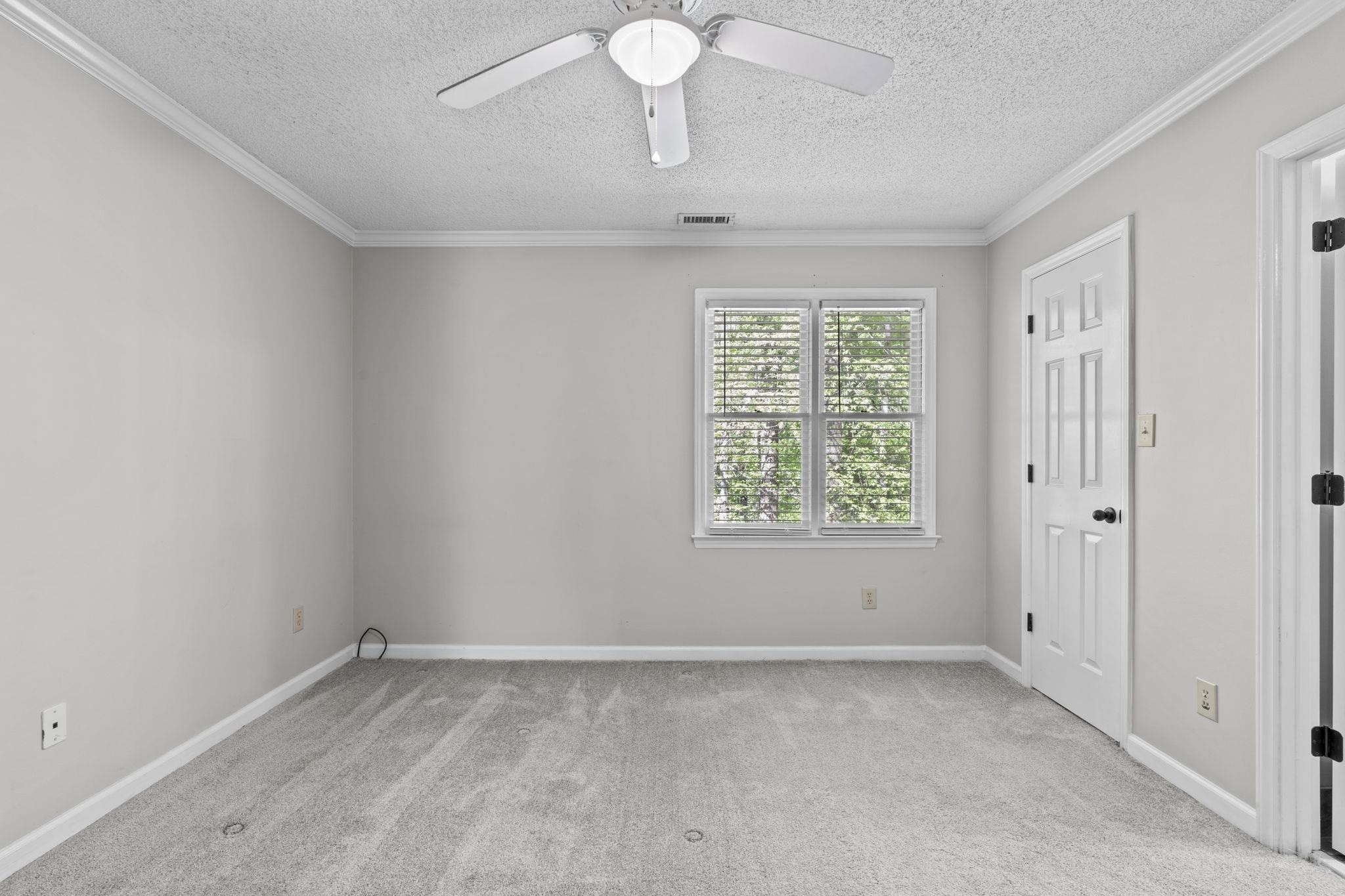 6506 Thetford Court Raleigh, NC 27615 - Photo 20 of 26 a view of an empty room with a window