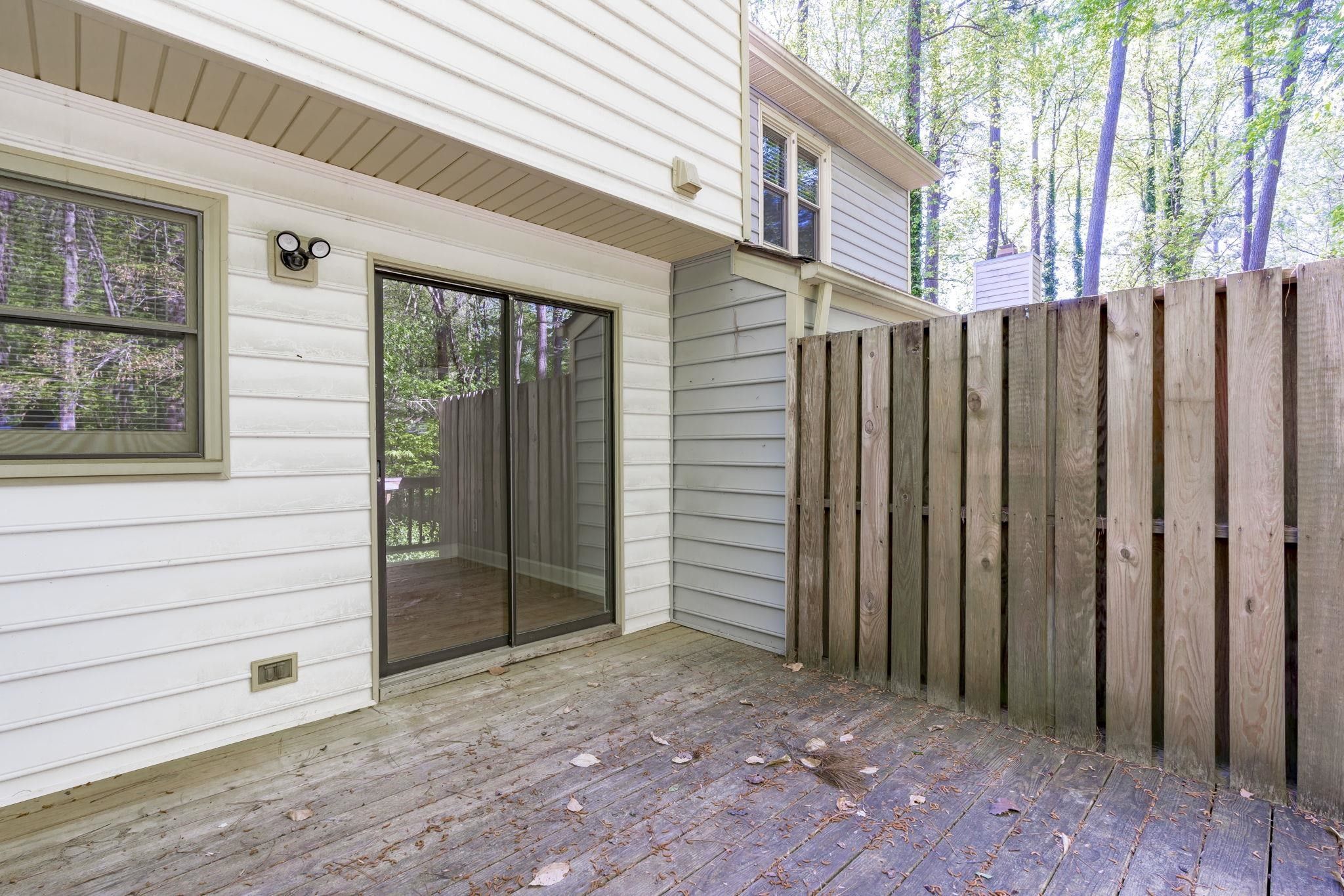 6506 Thetford Court Raleigh, NC 27615 - Photo 24 of 26 a view of a house with a wooden door