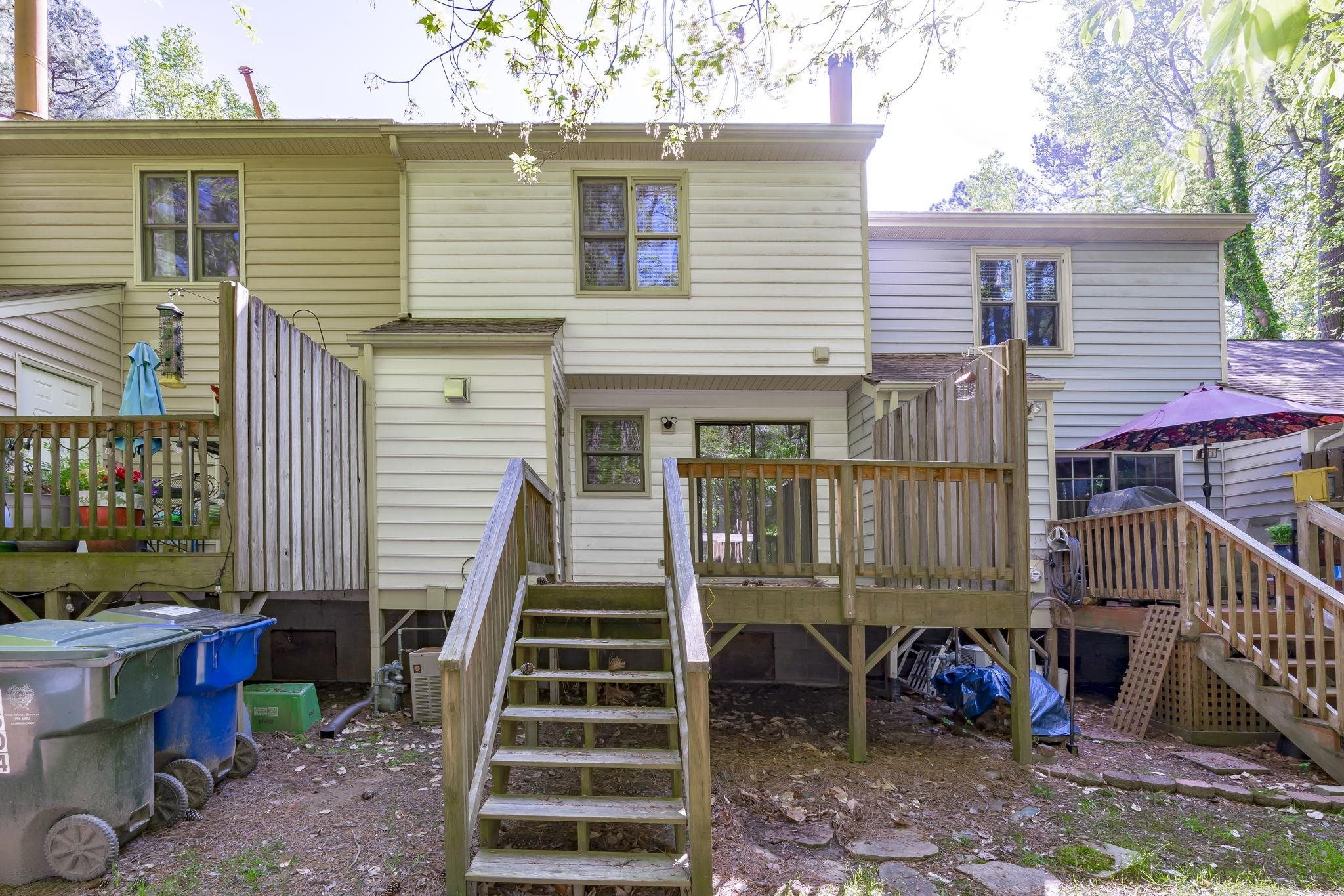 6506 Thetford Court Raleigh, NC 27615 - Photo 26 of 26 a view of a house with backyard and porch