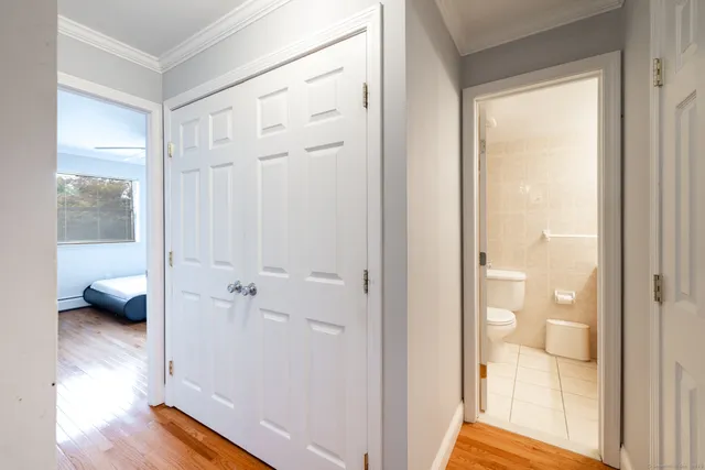 a view of bathroom with tub and shower