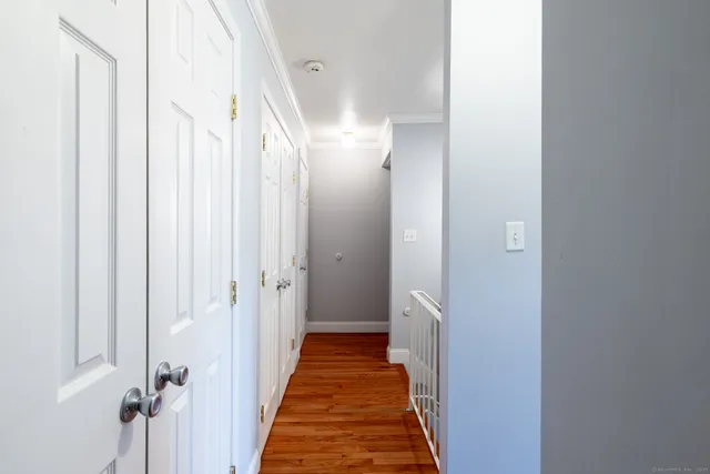 a view of a bathroom from the hallway