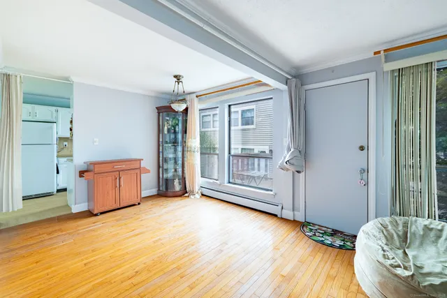 a view of livingroom with furniture and wooden floor