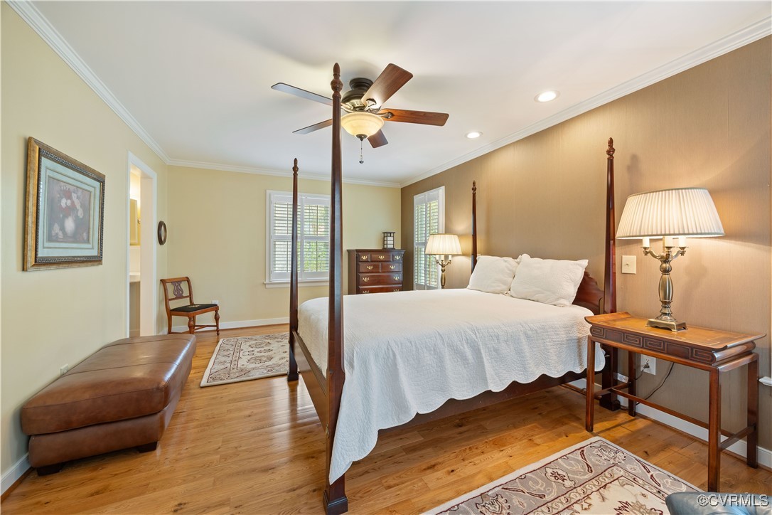 14204 Chimney House Road Midlothian, VA 23112 - Photo 19 of 39 a bedroom with a bed and wooden floor