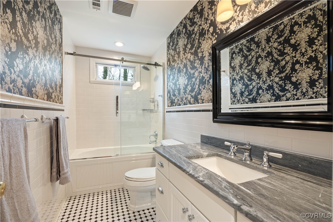 14204 Chimney House Road Midlothian, VA 23112 - Photo 22 of 39 a bathroom with a granite countertop sink toilet and shower