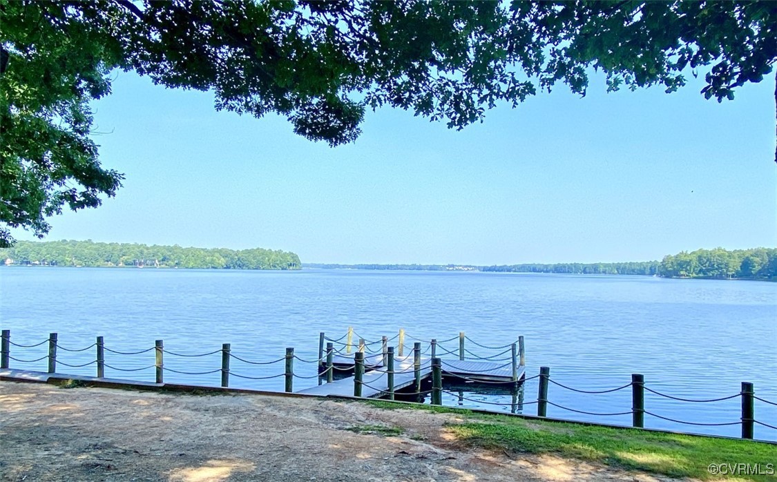14204 Chimney House Road Midlothian, VA 23112 - Photo 39 of 39 a view of a lake with a yard and large trees