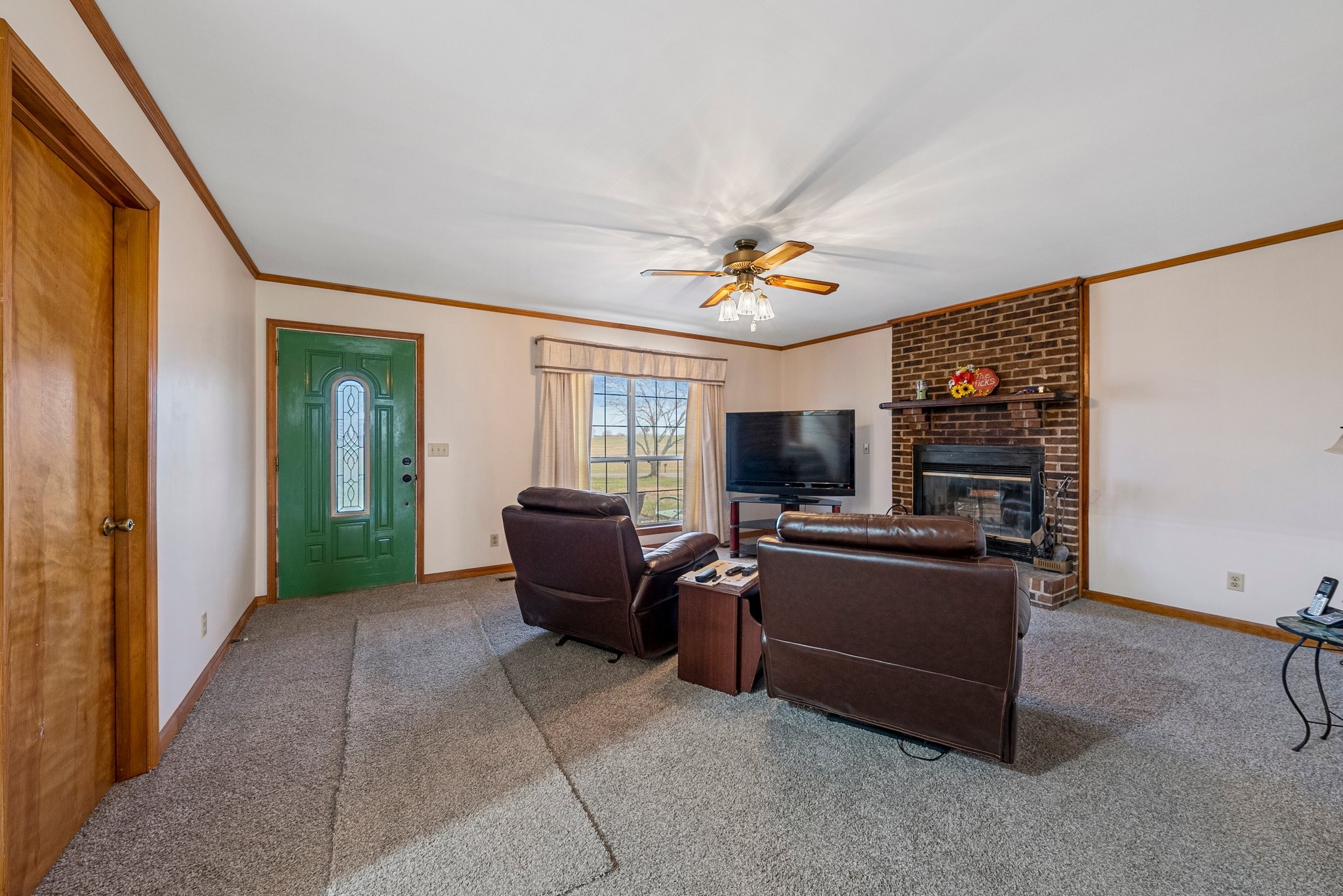 5066 Starks Road Cross Plains, TN 37049 - Photo 14 of 30 a living room with furniture and a flat screen tv