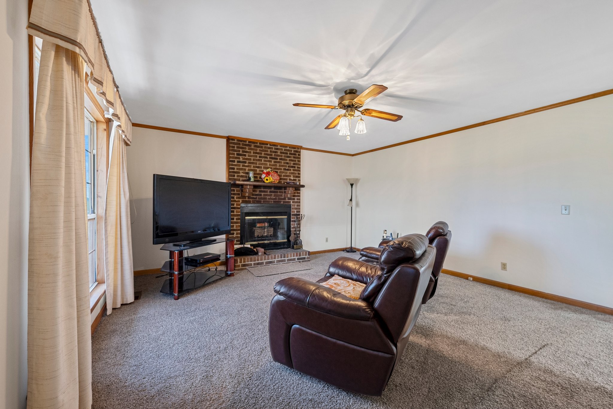 5066 Starks Road Cross Plains, TN 37049 - Photo 15 of 30 a view of a livingroom with workspace and a couch