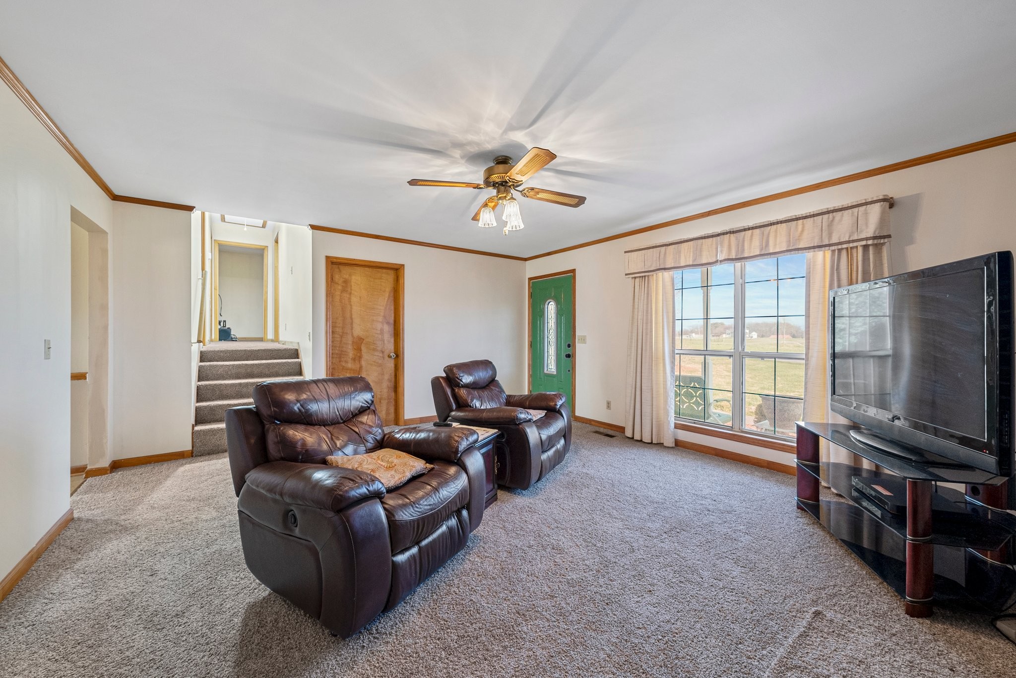 5066 Starks Road Cross Plains, TN 37049 - Photo 16 of 30 a living room with furniture and a flat screen tv