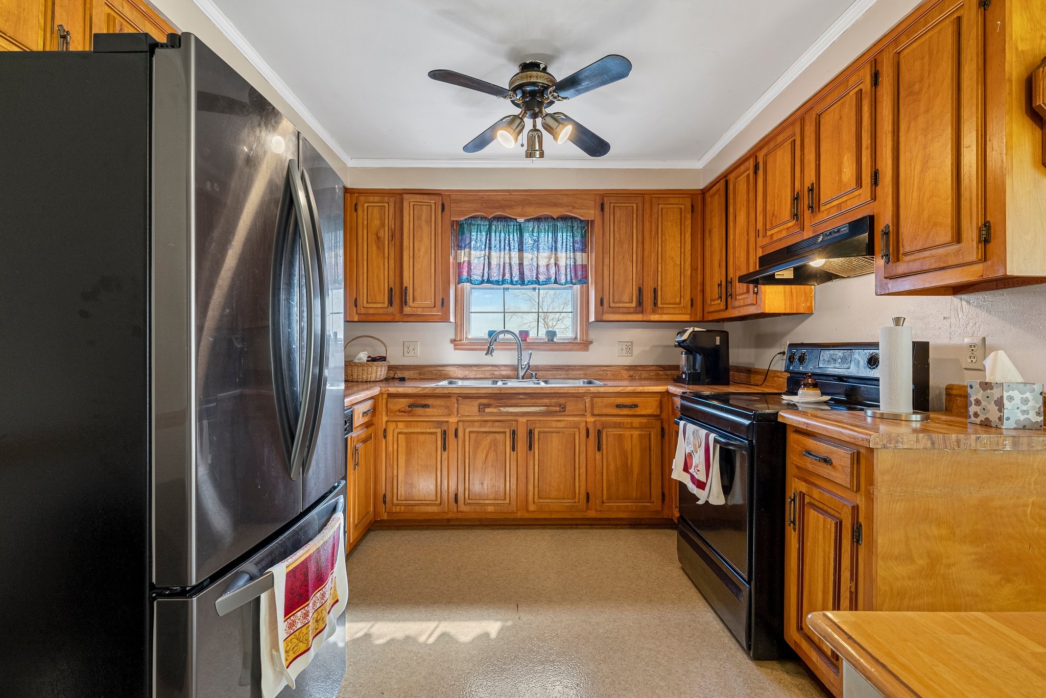5066 Starks Road Cross Plains, TN 37049 - Photo 18 of 30 a kitchen with stainless steel appliances granite countertop a refrigerator a stove and a sink