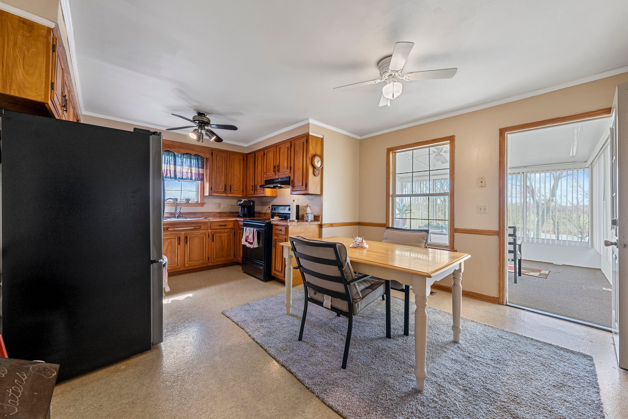5066 Starks Road Cross Plains, TN 37049 - Photo 22 of 30 a view of a dining room with furniture and a chandelier