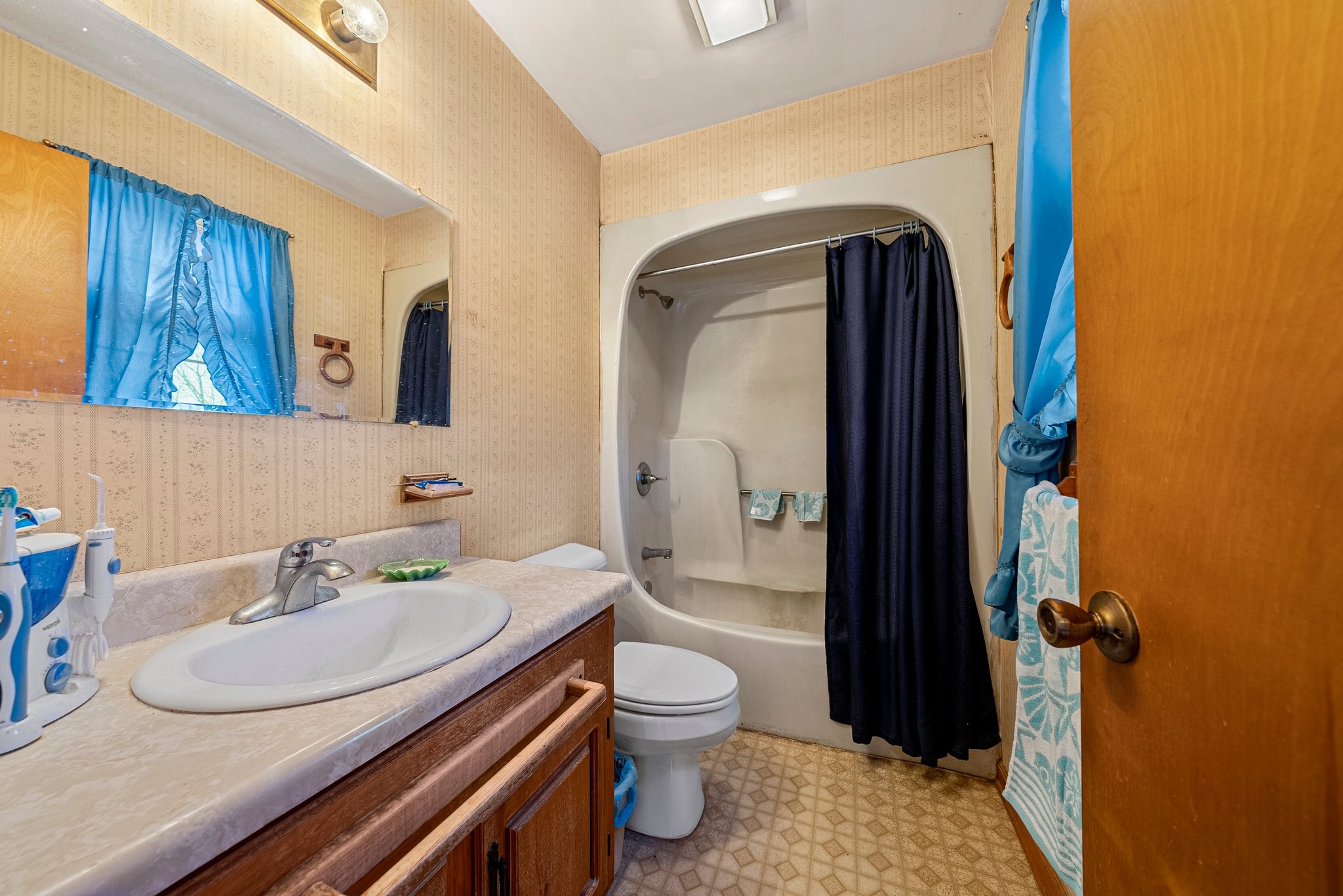 5066 Starks Road Cross Plains, TN 37049 - Photo 30 of 30 a bathroom with a granite countertop sink toilet and mirror