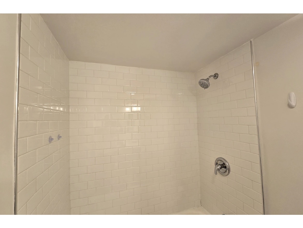 732 West Roscoe Street, Unit SGA Chicago, IL 60657 - Photo 13 of 13 a bathroom with a shower