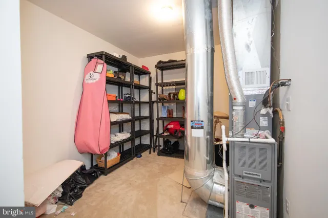a bathroom with a double vanity sink toilet and a mirror