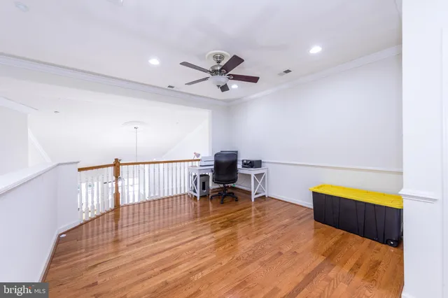 a view of storage and utility room with washer and dryer
