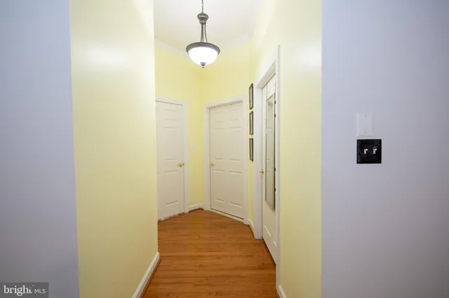 a bathroom with a tub and a mirror