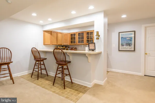 a view of a livingroom with furniture and wooden floor