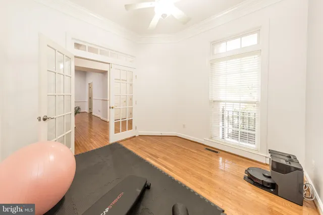 a large kitchen with stainless steel appliances granite countertop a large counter top a stove a sink and a refrigerator